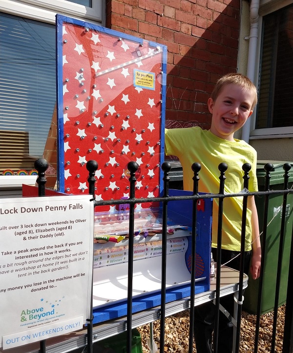 Oliver next to his arcade machine