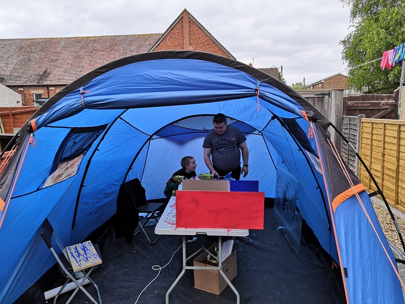 The red base inside a tent